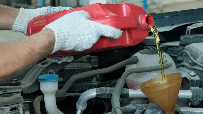 Car engine oil change process mechanic